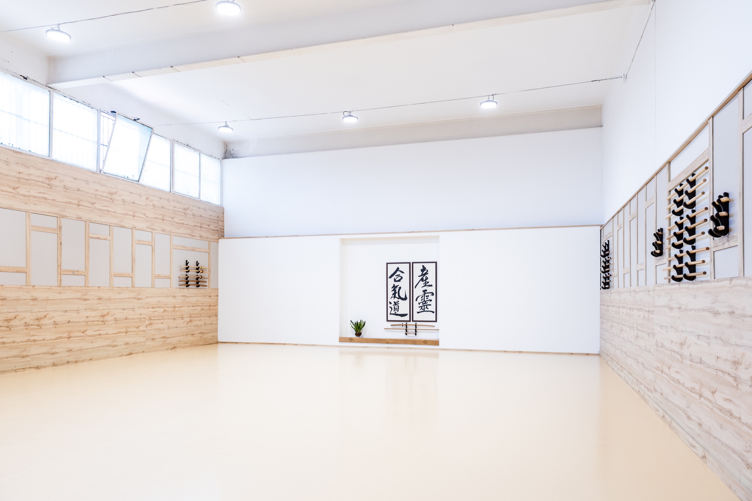 The wooden weapons on the dojo wall.