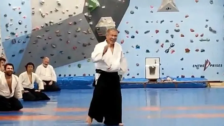Miyamoto T. Shihan (宮本 鶴蔵) showing Ryōte-dori Kokyū-nage (両手取り 呼吸投げ) w
