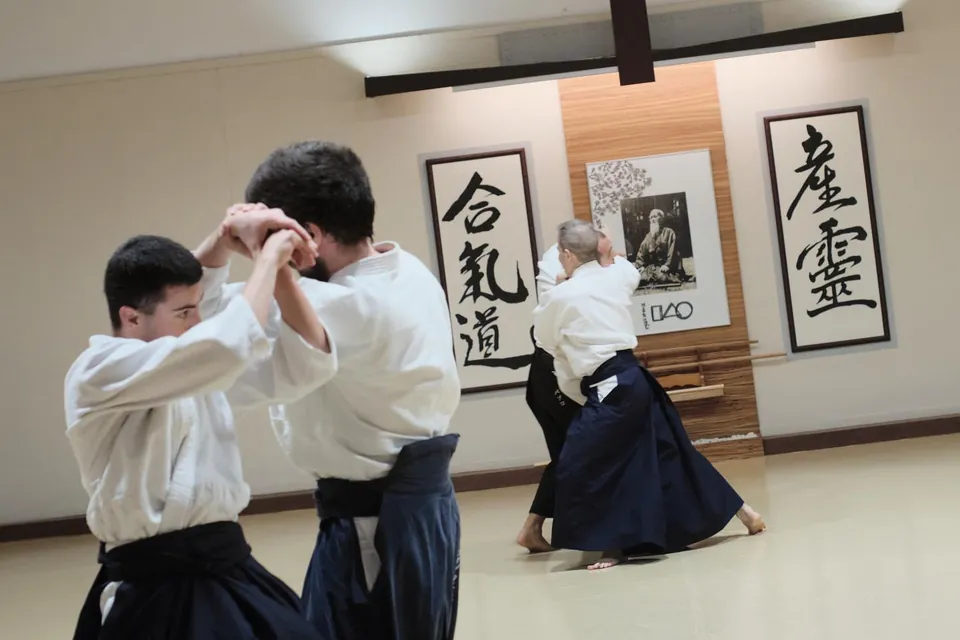 Shihō-nage (四方投げ) or four-direction throw; tori folds back uke's hand 