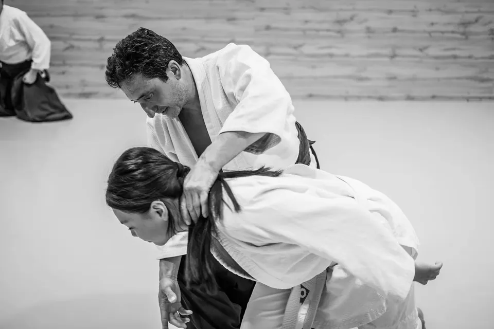 Carefully guiding through technique.
